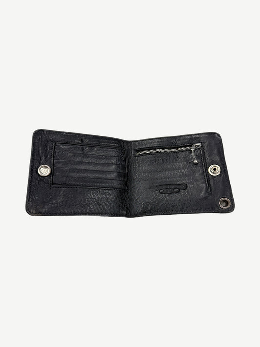 Chrome Hearts black leather wallet open interior with card slots, zip pocket and dual silver snap closures