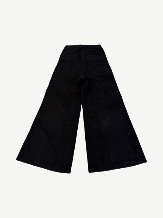 Back of Rick Owens Bela cargo pants in ecru canvas with utility back pockets and reinforced seam stitching.