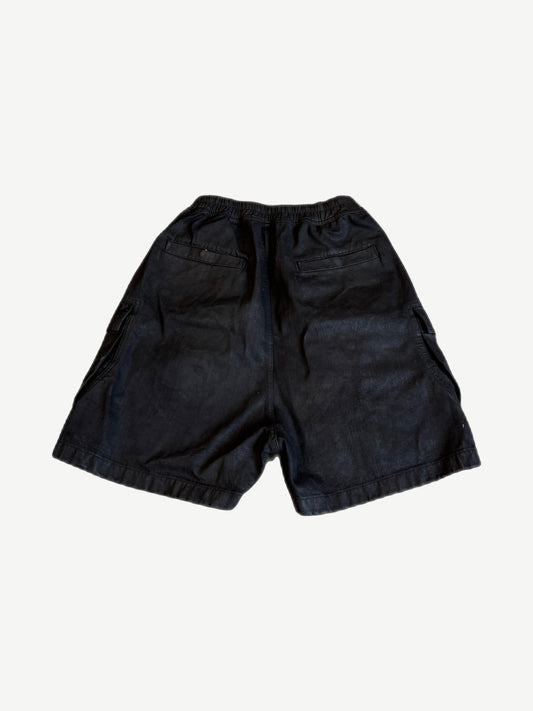Rick Owens Bela waxed black cargo shorts back view with welt pockets and elastic waistband