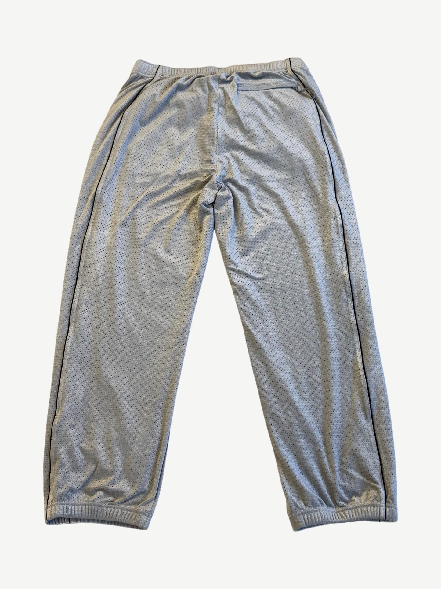Supreme grey velour mesh track pants back view with elastic cuffs and black side stripe