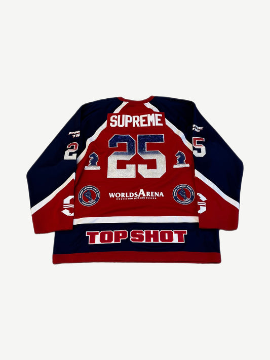 Back of Supreme rhinestone hockey jersey with crystal SUPREME nameplate, number 25 and Top Shot hem text