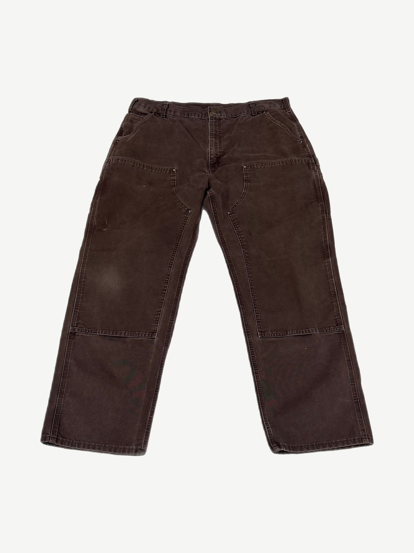 Vintage brown Carhartt double-knee canvas pants back view with hammer loop and patch rear pockets.