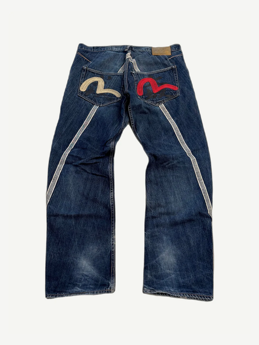 Vintage Evisu raw denim jeans back view with hand-painted red seagull logo on right pocket
