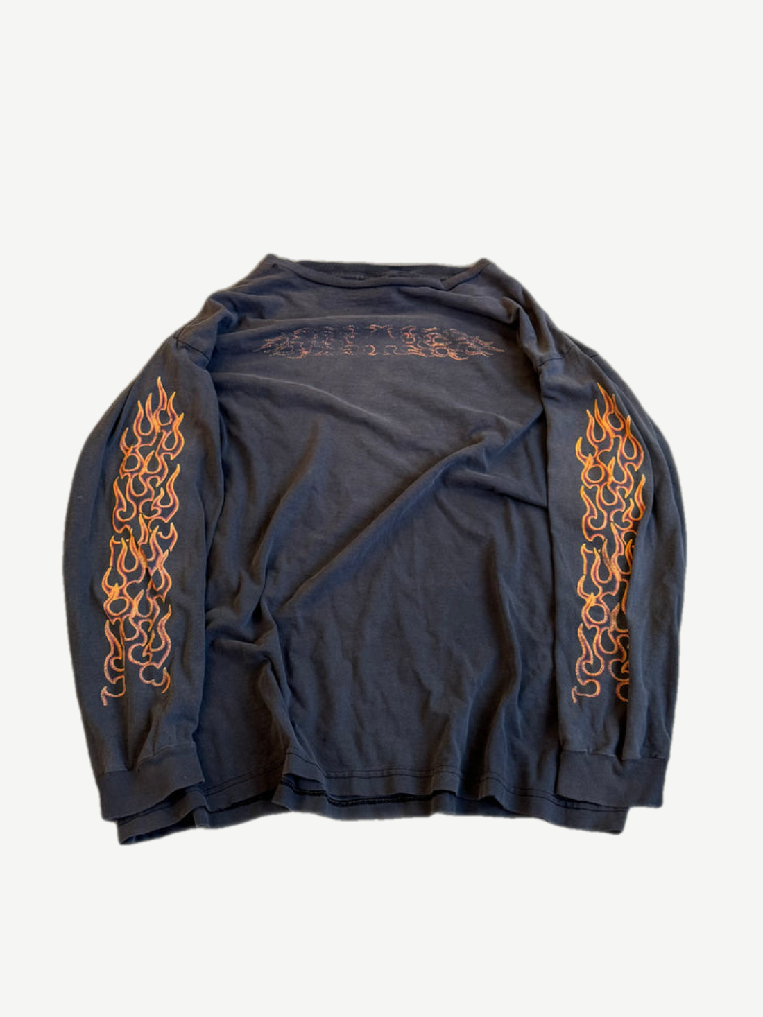Vintage Harley Davidson faded black longsleeve back with orange flame prints along both sleeves.