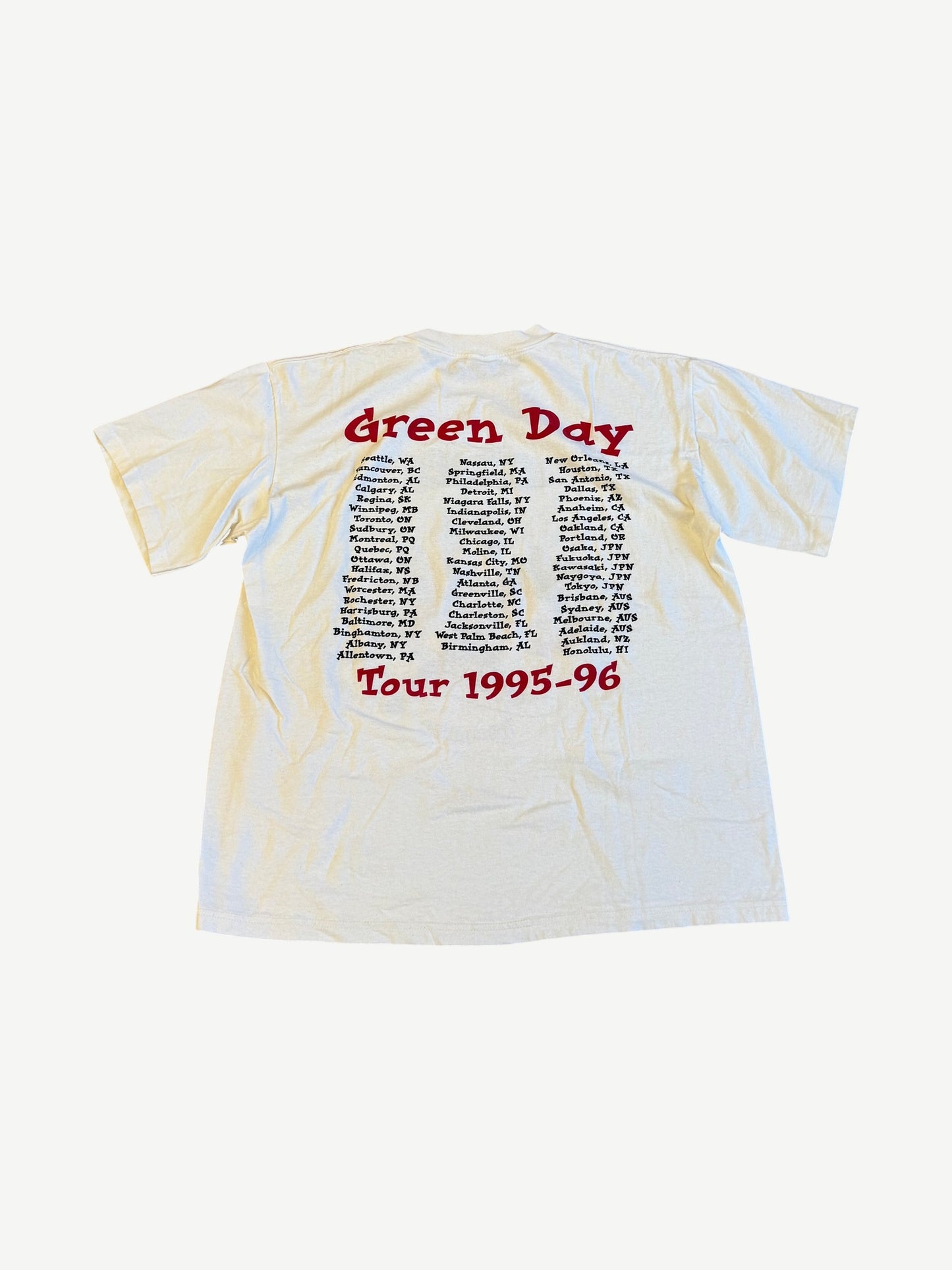 Back of vintage Green Day Insomniac 1995-96 tour tee with red title and full city tour date list.