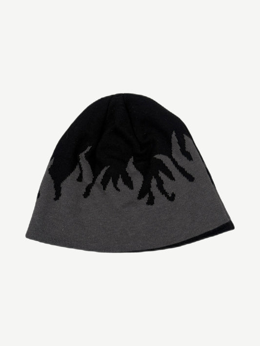Reverse side of vintage Harley-Davidson beanie showing gray base with black flame knit pattern detail