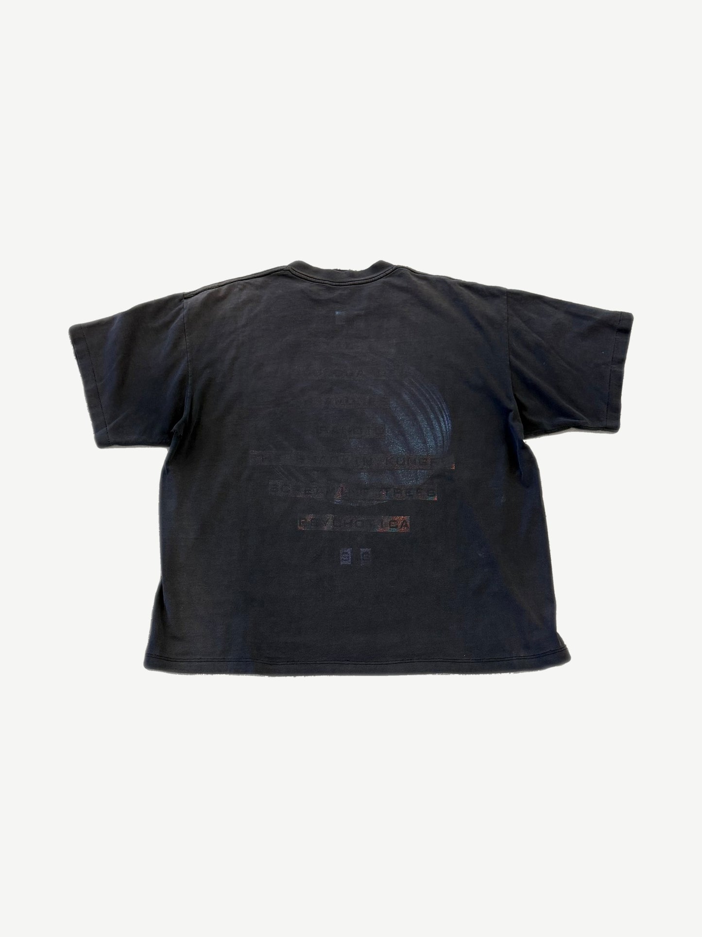Vintage Lollapalooza 1996 black tee back view with heavily faded tour date and city list print.