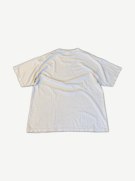 Vintage Metallica M2K tour tee back view in aged cream cotton with relaxed boxy vintage cut.