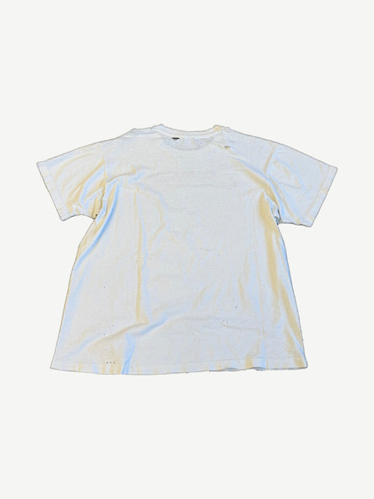 Vintage The Simpsons white tee back view with naturally aged stains and small pinhole distressing.