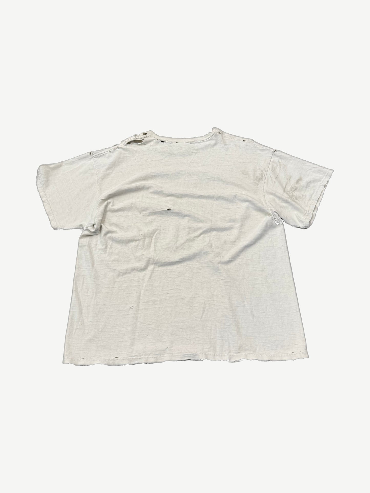 Back view of vintage distressed white Destination Anywhere tee with thrashed holes throughout body and sleeves