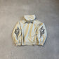 Back of Balenciaga cream tribal zipup hoodie with black tribal tattoo print across shoulders and sleeves