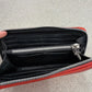 Chrome Hearts red long wallet interior view showing black leather card slots and zip coin pocket