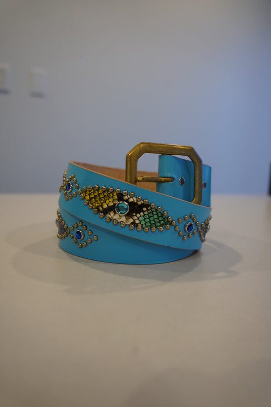 Vintage light blue leather belt with brass buckle, snakeskin inlay panels and silver studs around blue gem