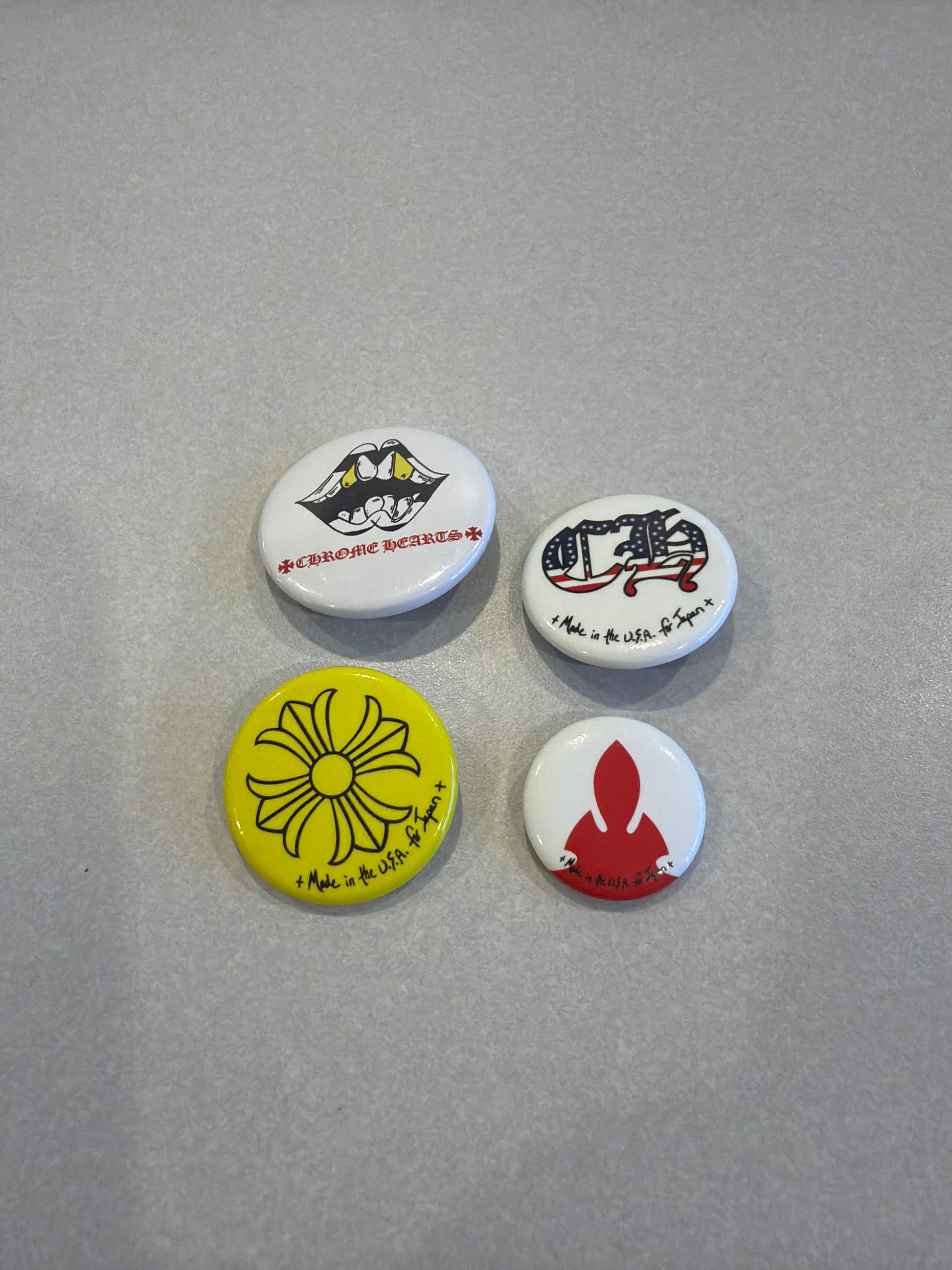 Chrome Hearts Matty Boy 4 pin set displayed together, multicolor enamel lapel pins with cartoon character graphics.