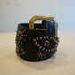 Vintage black studded leather belt with double row pyramid studs and silver roller buckle hardware