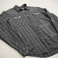 Chrome Hearts grey plaid flannel angled view showing zipper chest pockets and leather cross applique