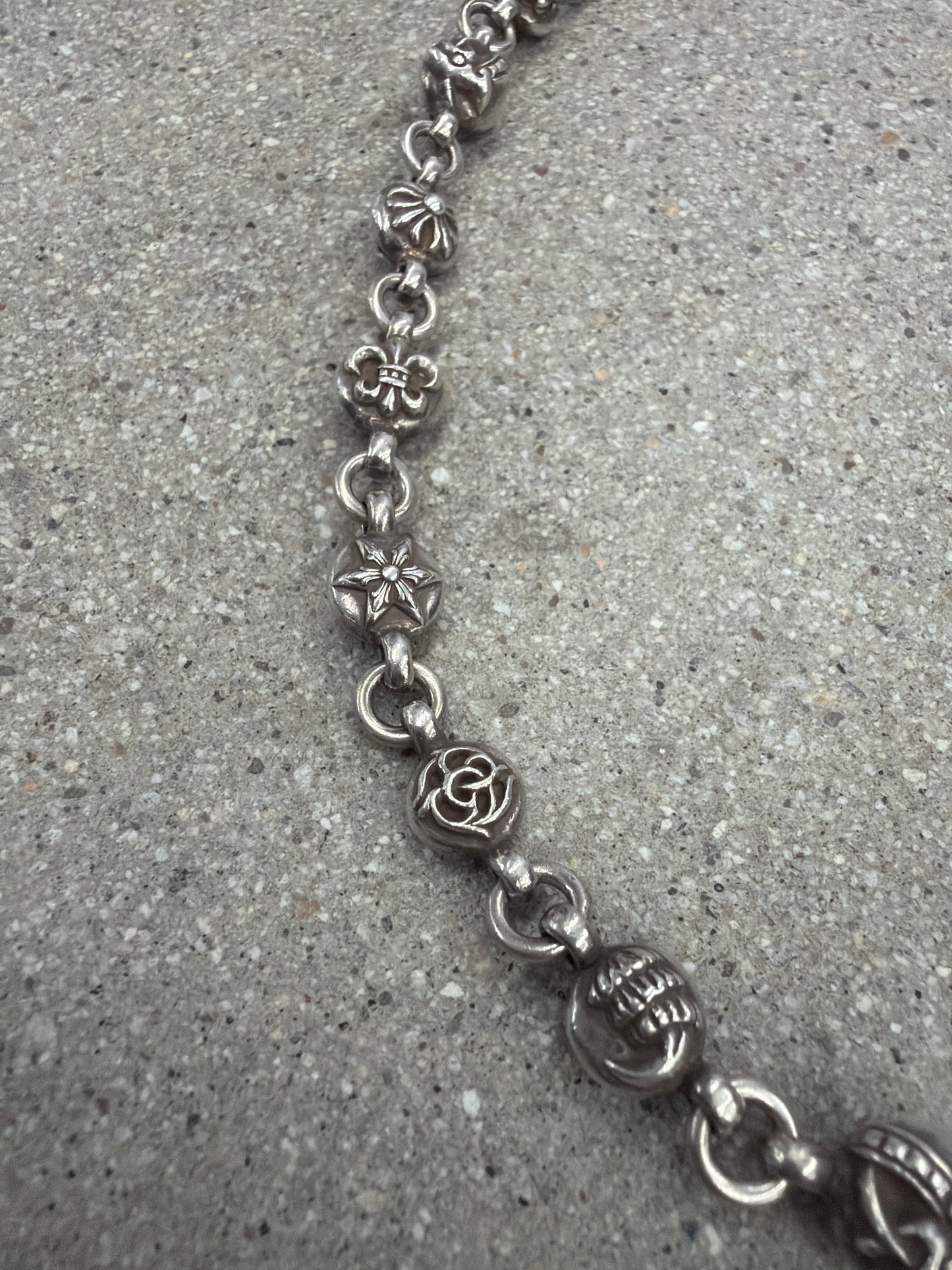 Chrome Hearts silver multi cross ball necklace clasp and pendant detail close-up