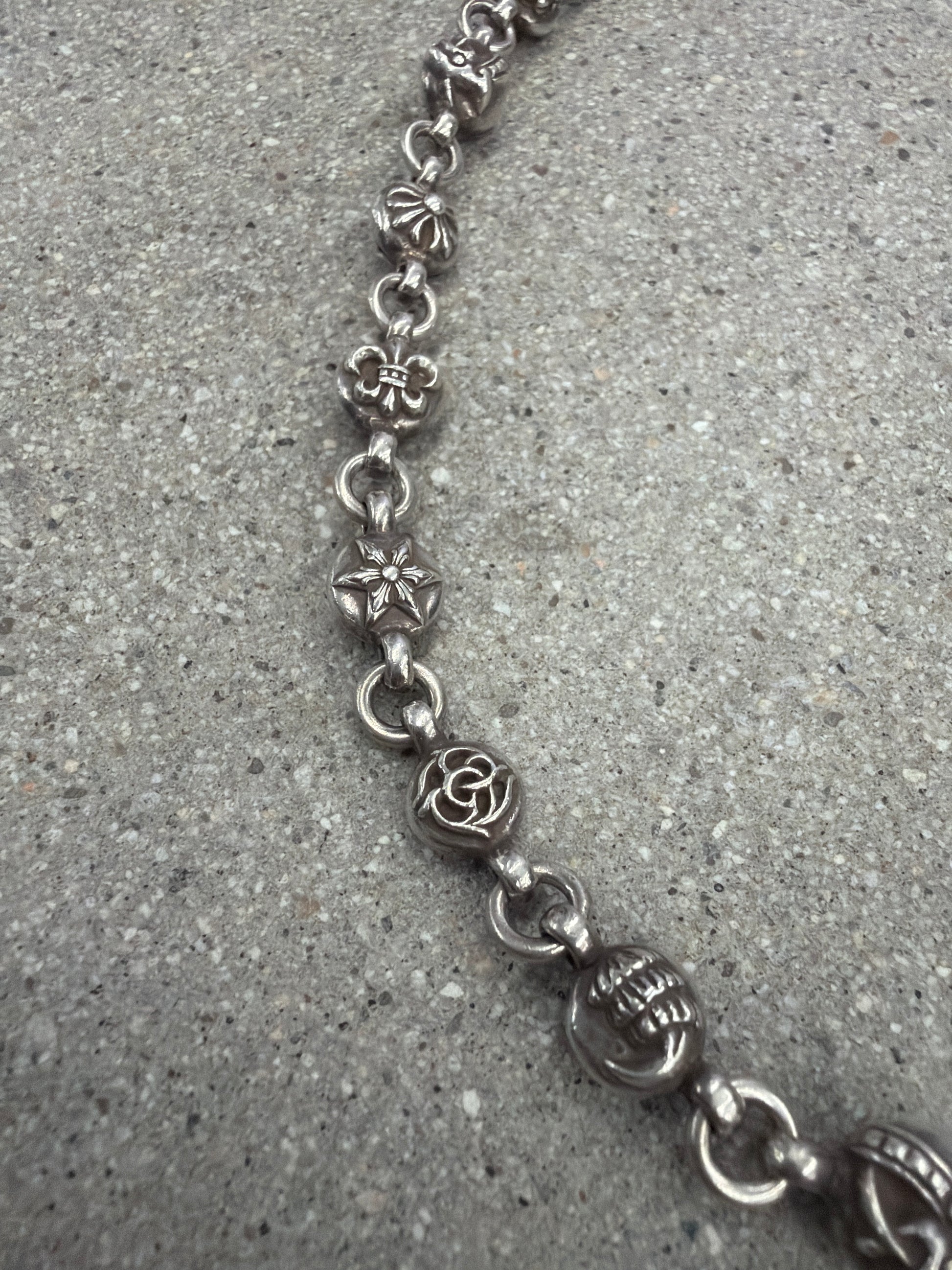 Chrome Hearts silver multi cross ball necklace clasp and pendant detail close-up
