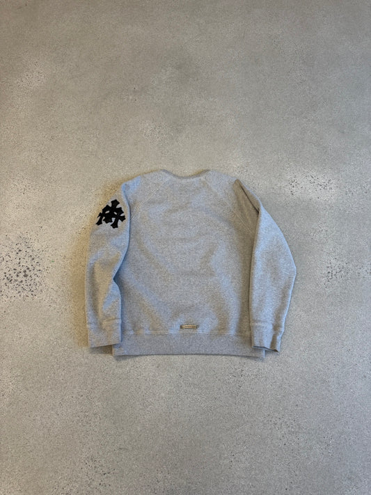 Chrome Hearts Paper Jam crewneck, back view showing layered triple cross print on heather gray