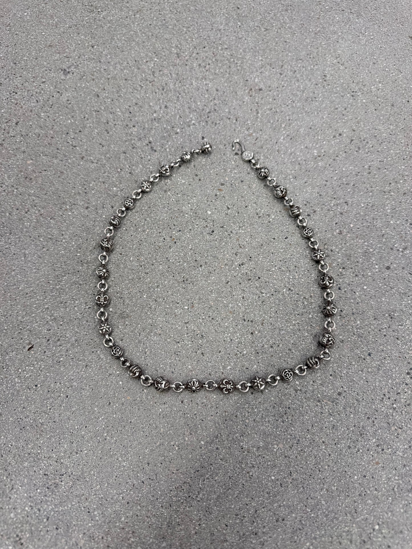 Chrome Hearts sterling silver multi cross ball necklace coiled showing cross beads