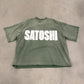 Satoshi Nakamoto green oversized impact logo tee front with bold white SATOSHI block lettering