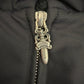 Chrome Hearts black Cobra racing jacket collar zipper pull with silver scroll dagger hardware
