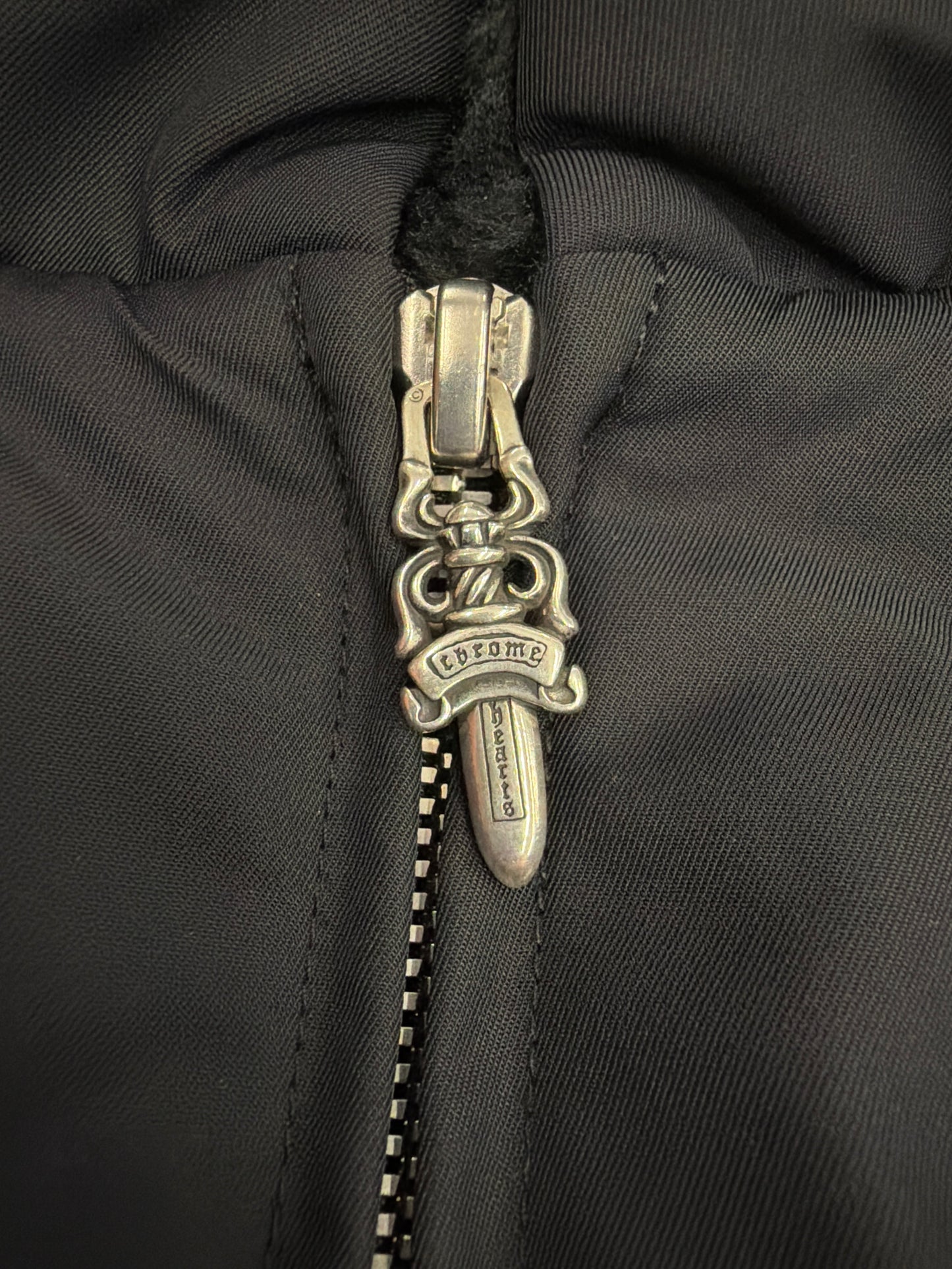 Chrome Hearts black Cobra racing jacket collar zipper pull with silver scroll dagger hardware