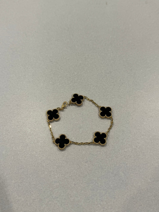 Van Cleef & Arpels 18k gold Alhambra bracelet with 5 black onyx clover motifs and gold bead trim