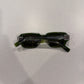 Chrome Hearts Matty Boy green sunglasses folded top-down view showing silver cross-engraved temple plates