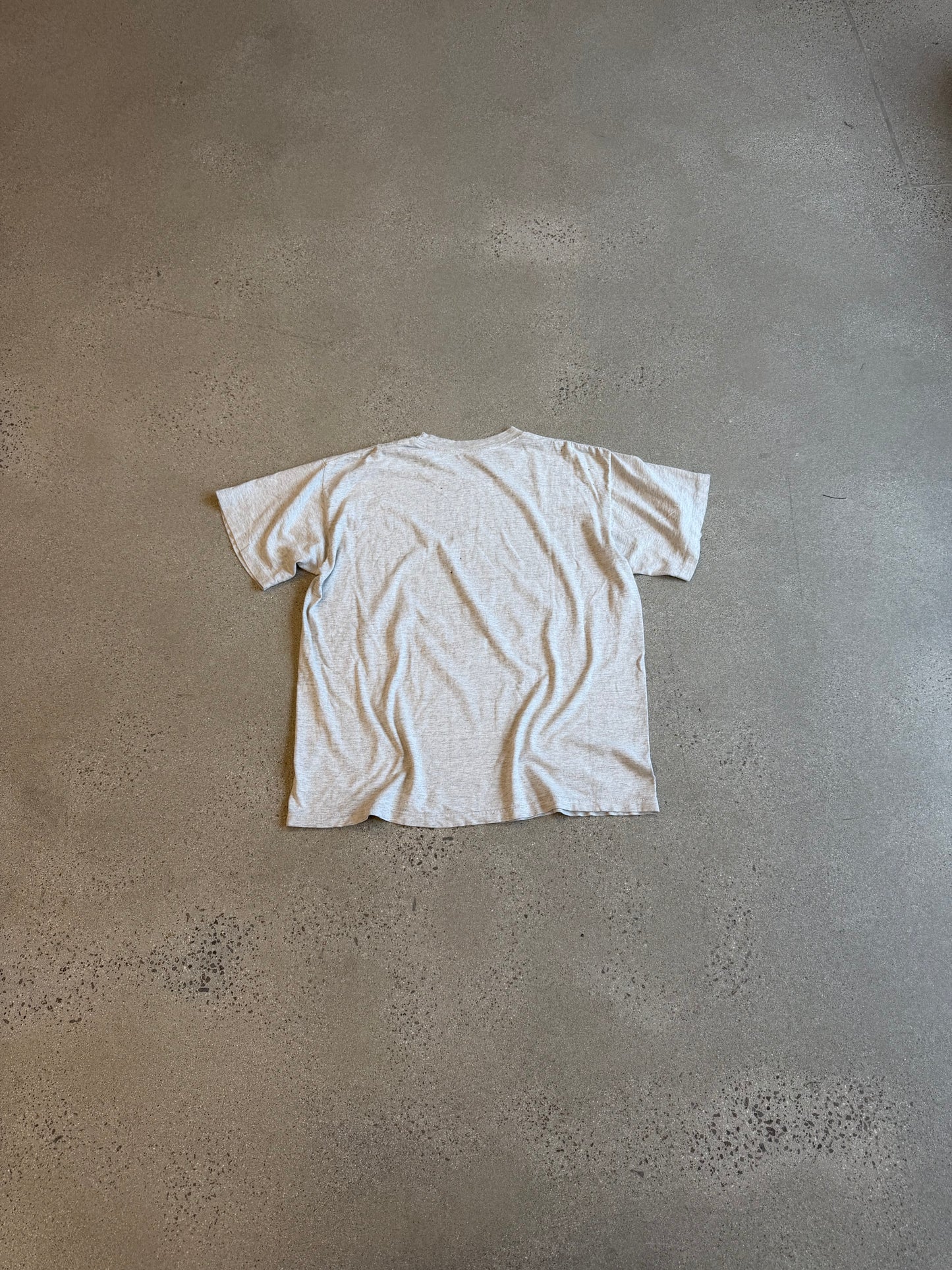 Vintage Betty Boop heathered cream tee back blank cotton view laid on concrete floor