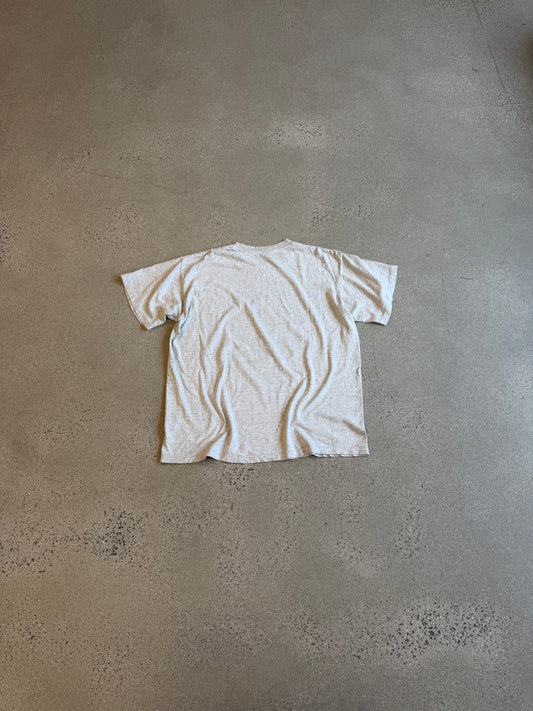 Vintage Betty Boop heathered cream tee back blank cotton view laid on concrete floor