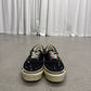 Satoshi Nakamoto Lucky Charm Vans, front view with multicolor beaded laces on distressed canvas