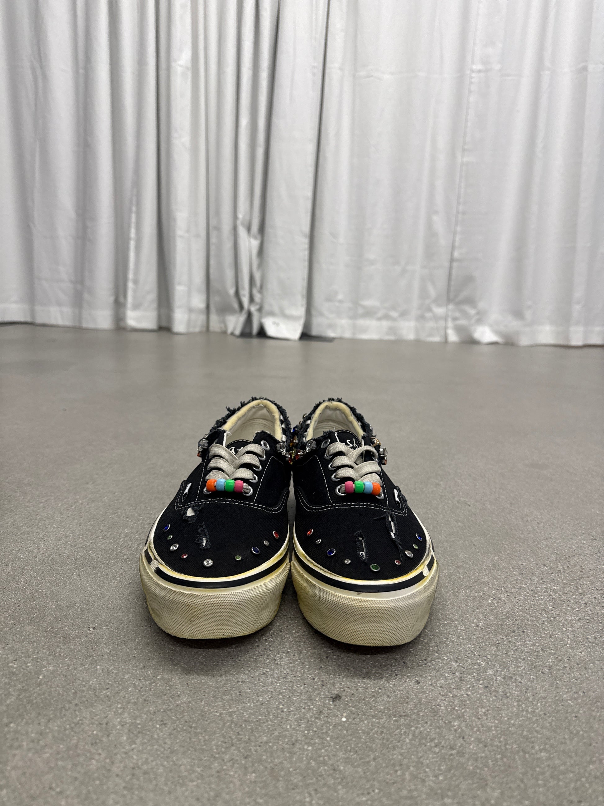 Satoshi Nakamoto Lucky Charm Vans, front view with multicolor beaded laces on distressed canvas