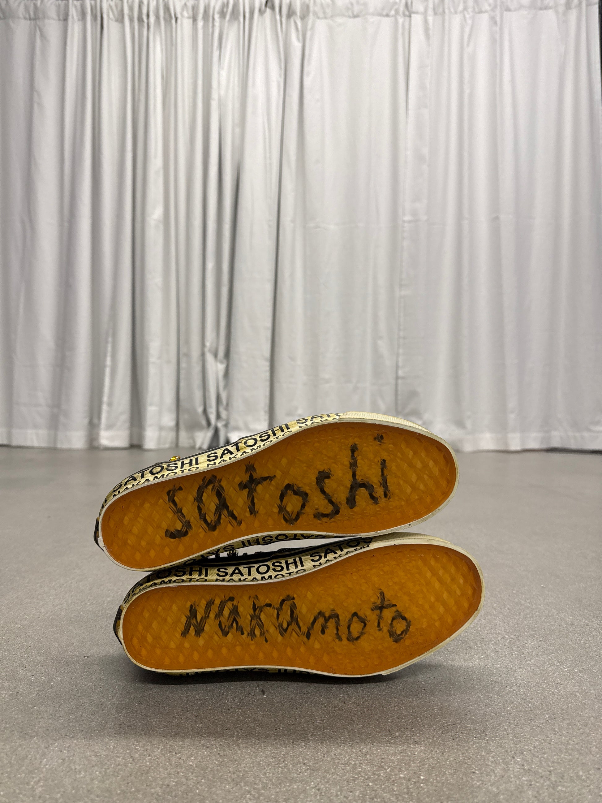 Satoshi Nakamoto Vans Era, sole view with orange gum sole and handwritten marker signature