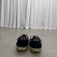Satoshi Nakamoto Vans Era, heel view of black suede counter and printed text along midsole stripe