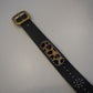 Vintage studded black leather belt detail with cheetah print calf hair inset and silver rivet trim