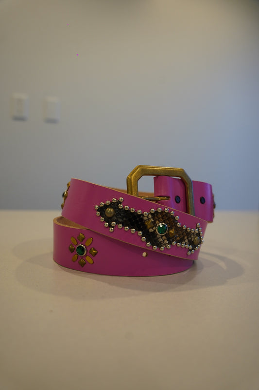 Vintage pink snakeskin leather belt with pyramid stud trim and silver-tone buckle, full length view