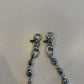 Chrome Hearts wallet chain close-up of double lobster clasp ends and engraved silver cross ball links