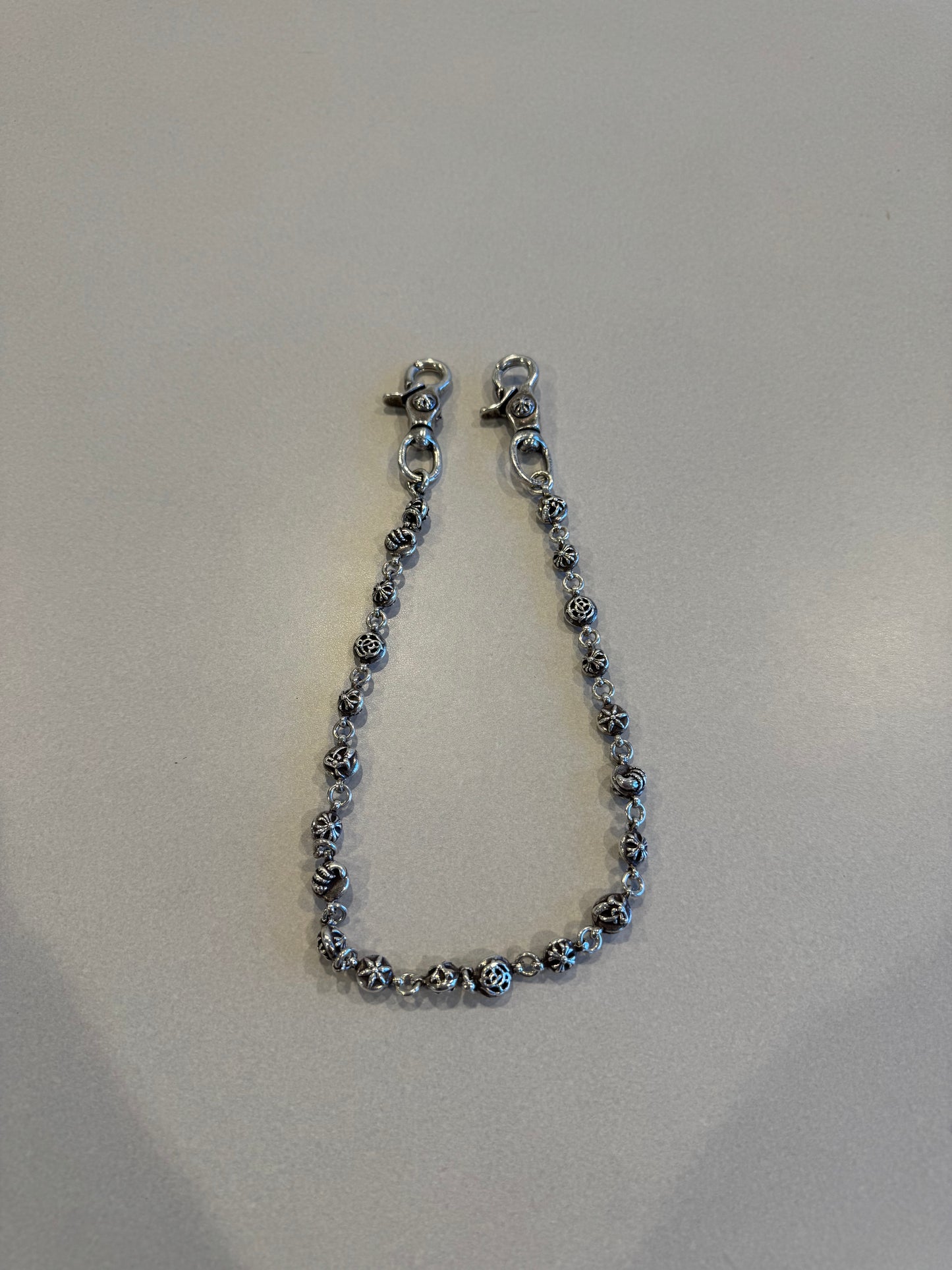 Chrome Hearts 24 inch wallet chain laid flat showing full multi motif cross ball link length