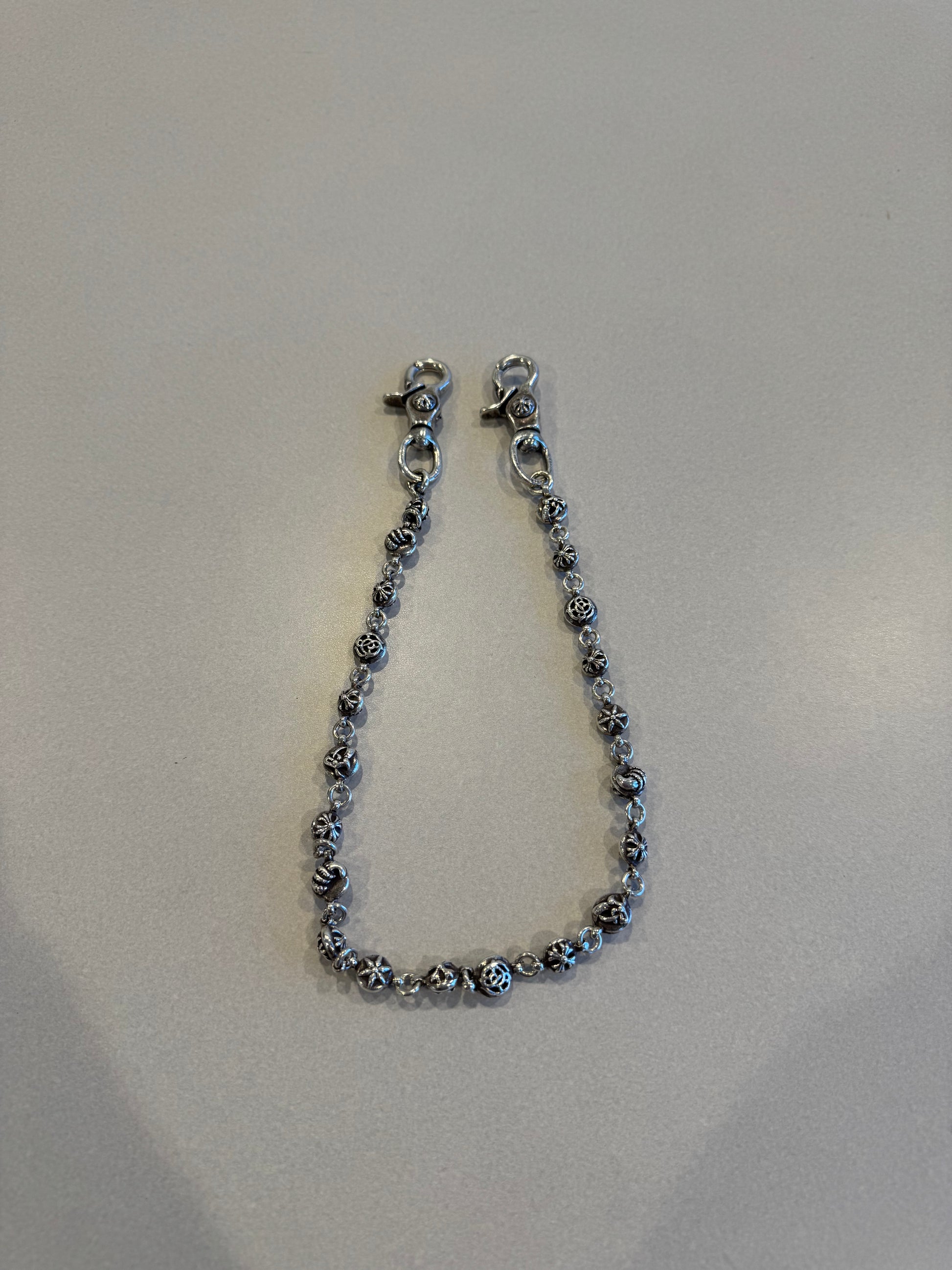Chrome Hearts 24 inch wallet chain laid flat showing full multi motif cross ball link length