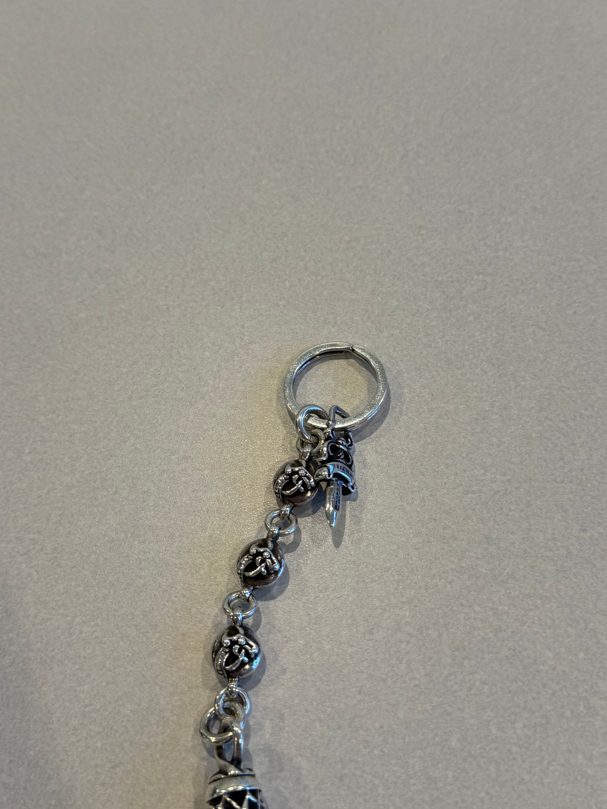 Chrome Hearts Celtic dagger key ring split ring detail with dagger charm and three roller ball bead chain
