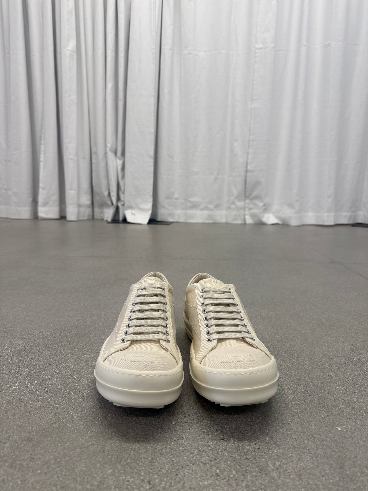 Rick Owens DRKSHDW milk vintage sneakers front view showing tonal lacing and rounded leather toe box