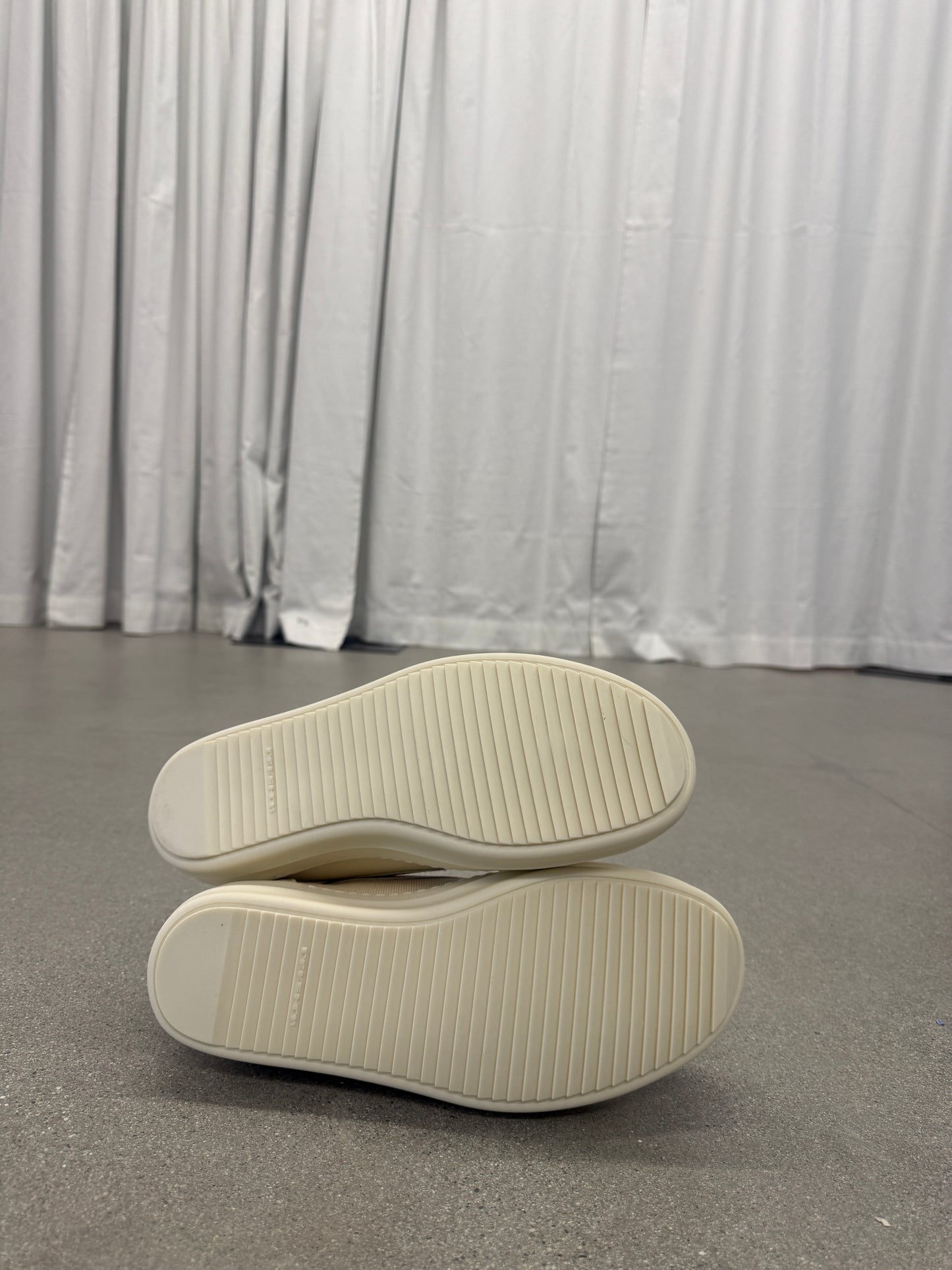 Rick Owens DRKSHDW milk vintage sneakers sole view showing ribbed cream rubber outsoles