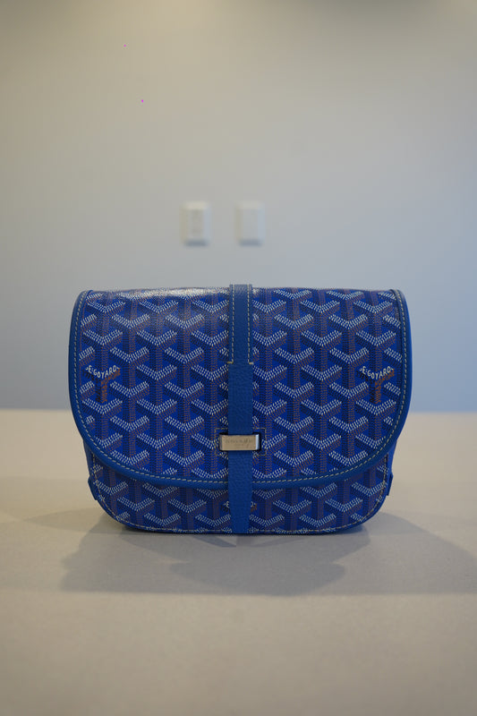 Goyard Belvedere PM blue chevron monogram shoulder bag front with leather trim, top flap and brass plaque.