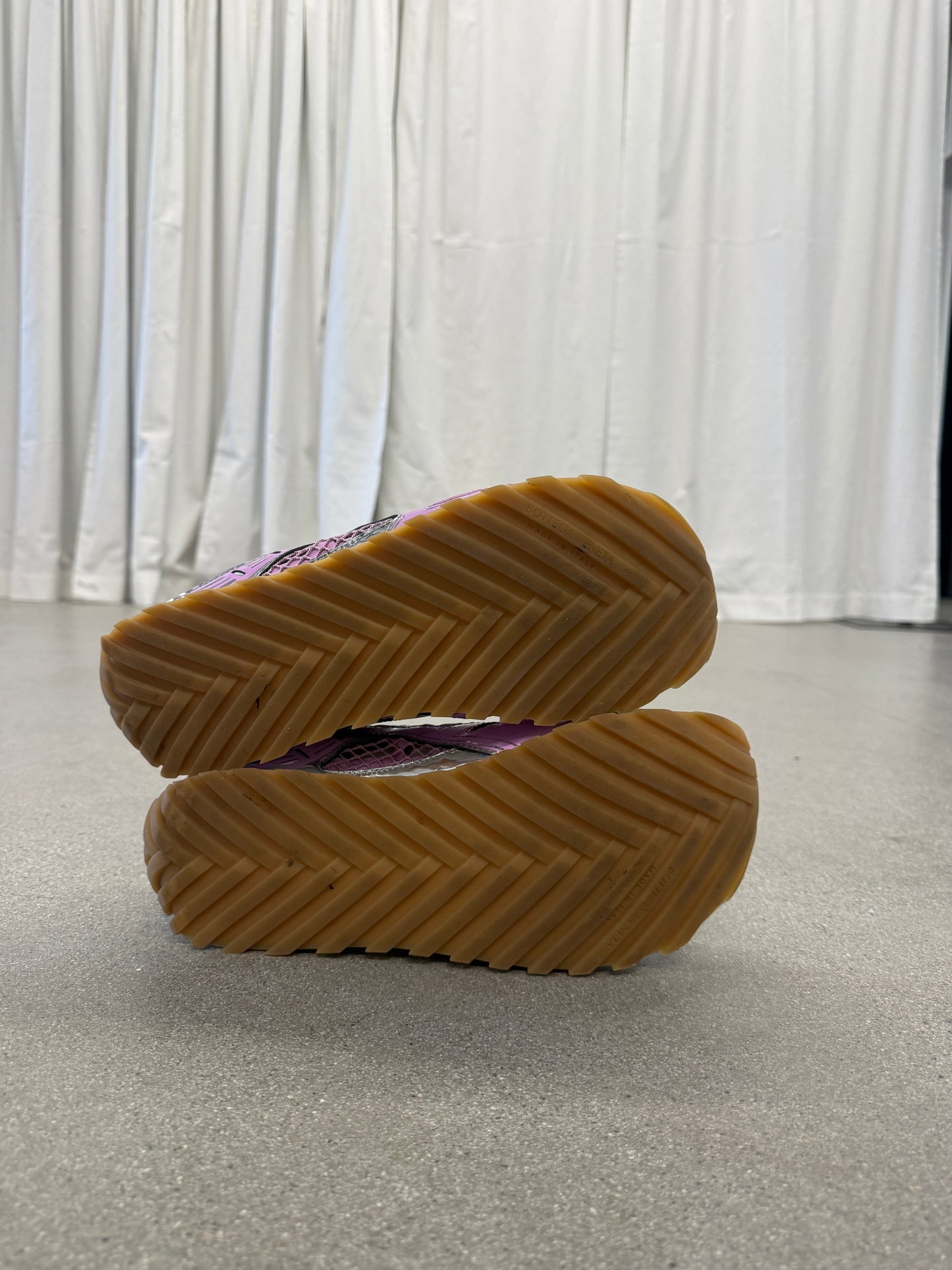 Bottega Veneta Orbit pink sneakers outsole view showing chunky gum chevron tread pattern