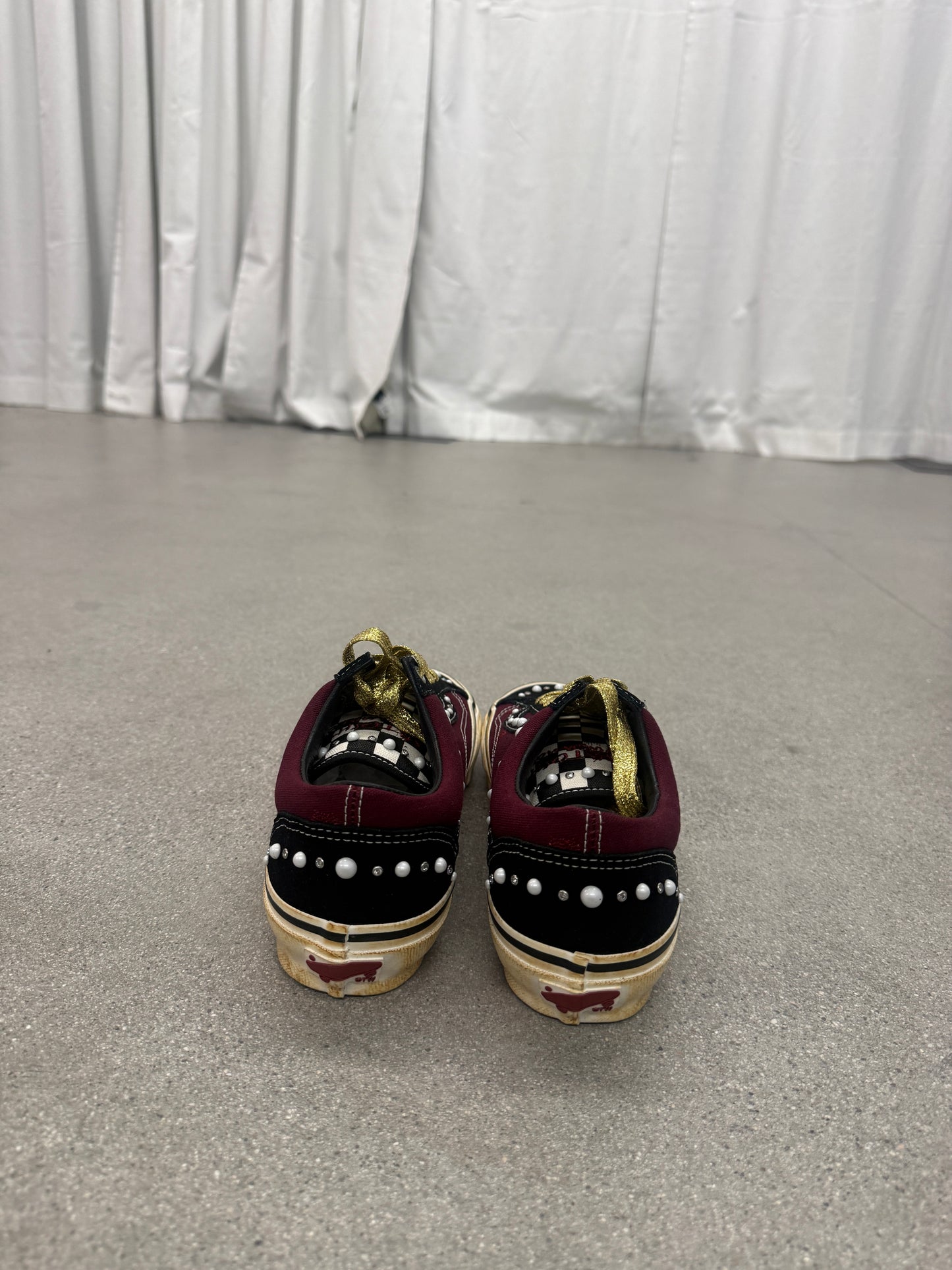 Top view of Satoshi Nakamoto Friends and Family Vans Old Skool laced up on pearlized burgundy leather upper.