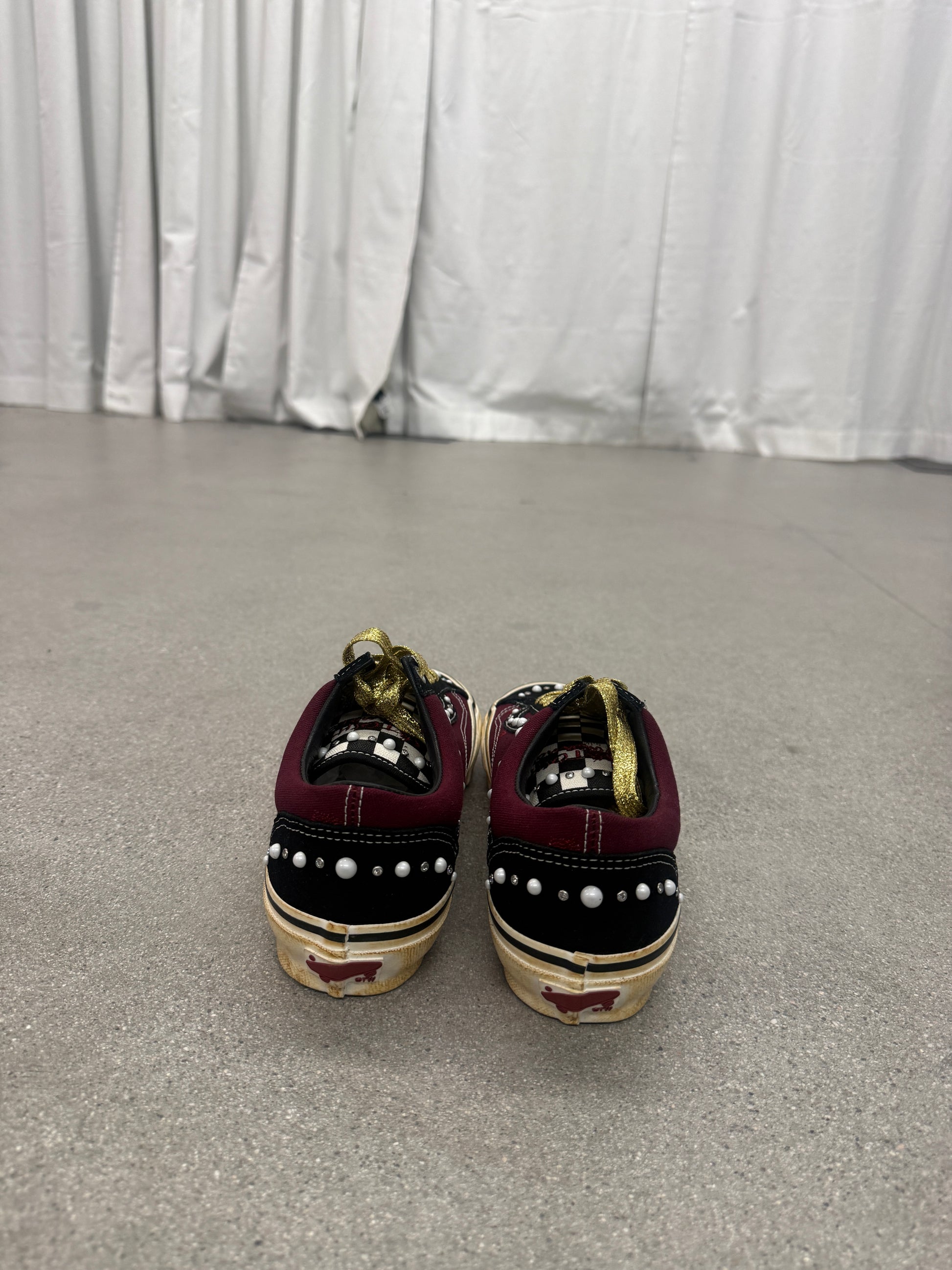 Top view of Satoshi Nakamoto Friends and Family Vans Old Skool laced up on pearlized burgundy leather upper.