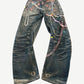 Back view of Acne Studios 1981 trompe l'oeil keychain jeans with rear leather patch and printed chain and pearl motifs