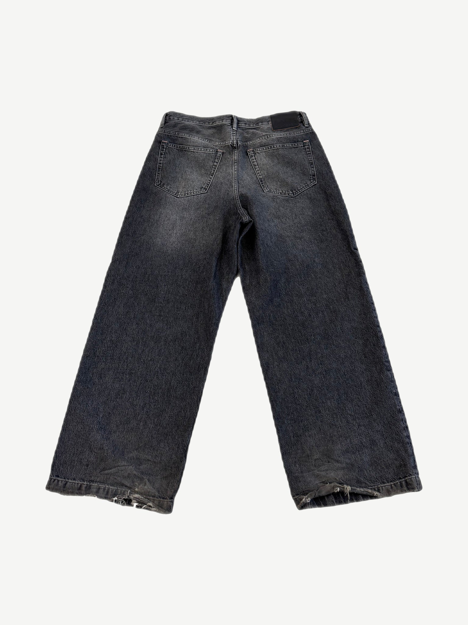 Acne Studios 1989 ash black baggy jeans back with leather logo patch and distressed hem