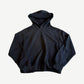 Acne Studios black fleece hoodie with relaxed boxy silhouette, oversized hood and ribbed cuffs.